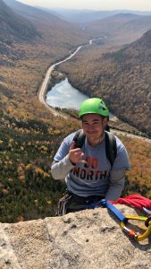 man rock climbing