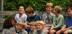 group of boys smiling and laughing