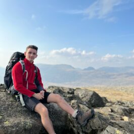 man backpacking