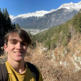 boy hiking in mountains