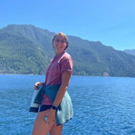 girl in front of lake