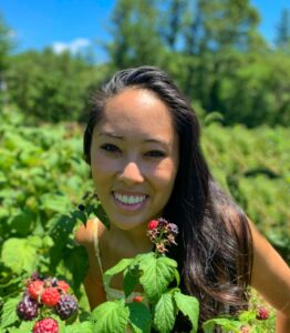 girl with berry bush
