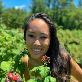 girl with berry bush