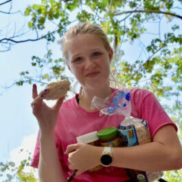 girl eating rice cake